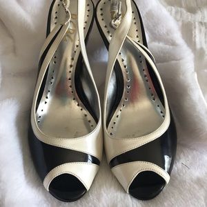 Lightly wore black and white dress heel